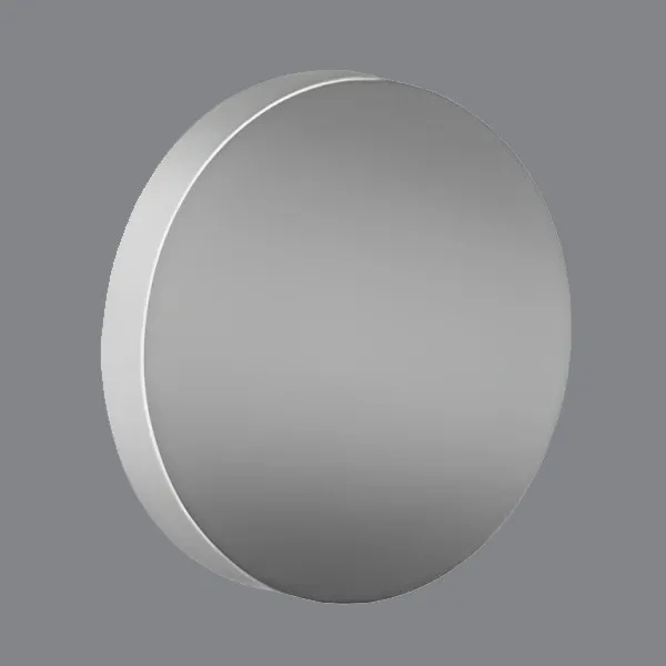 Round flat mirror on a grey background