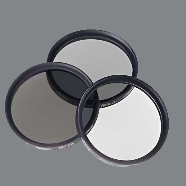 Three mounted neutral density filters in black rings