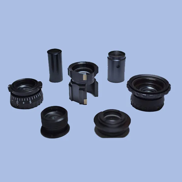 Black anodised lens housings and optical mounts