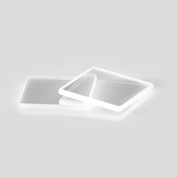 Two square optical windows stacked on a light background